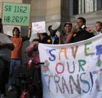 Save Our Transit members rally at the City-County Building on Monday